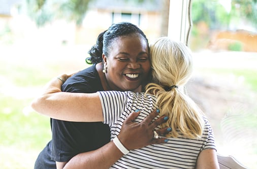 two women hugging