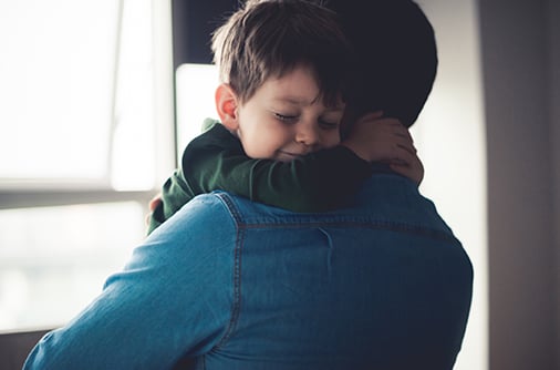 Child Hugs Dad